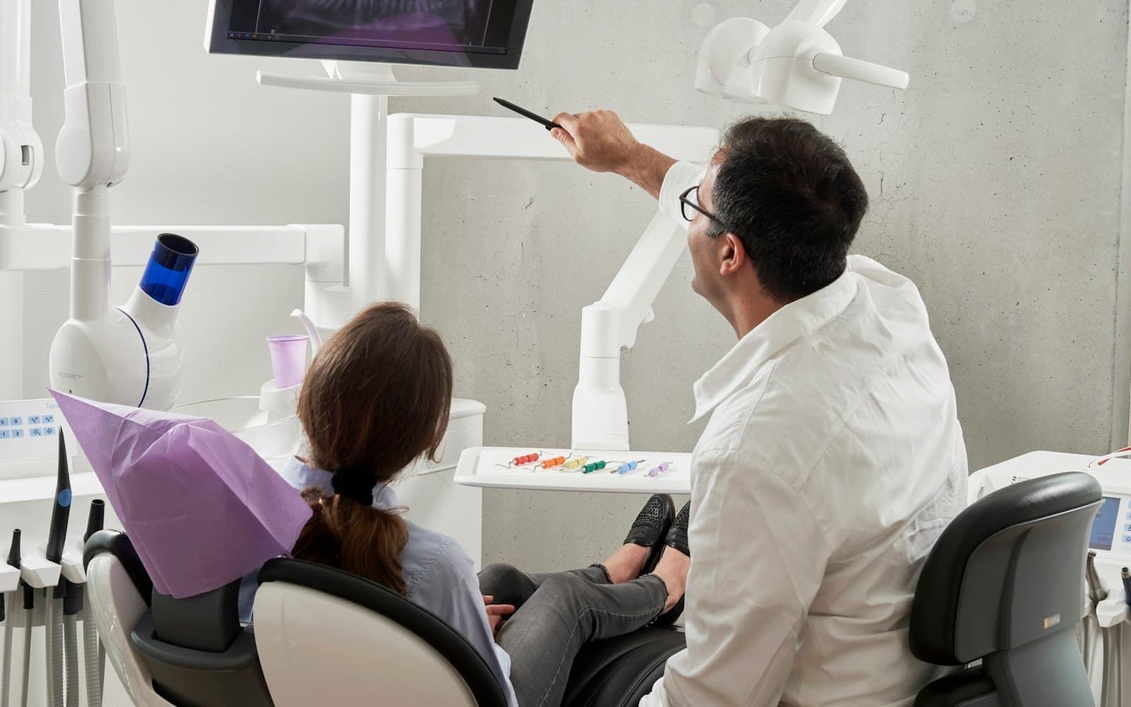 Patient in a dental chair during a cosmetic whitening visit