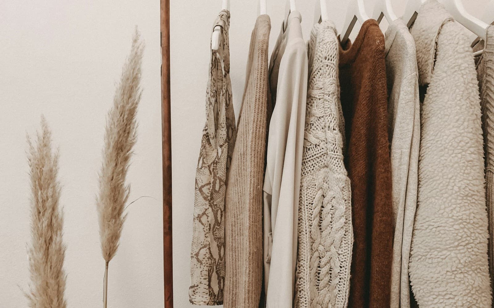 Curated garments hanging on racks in a fashion boutique
